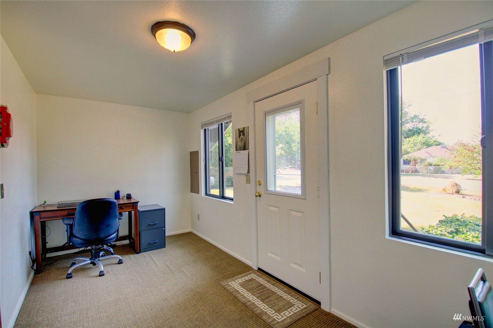 17344 Bennett Road Mount Vernon, WA 98273 - Photo 3 of 31 a view of a workspace with furniture and a window