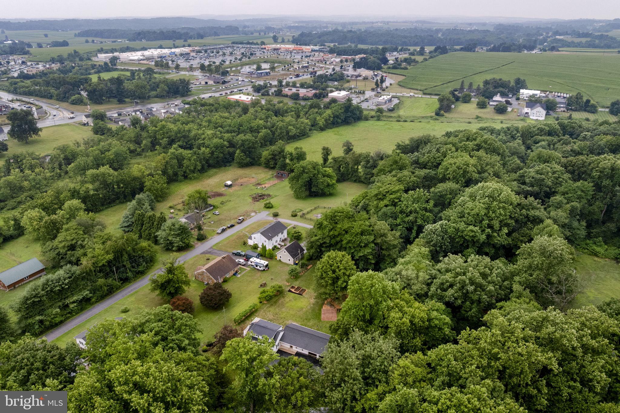 65 Compass Road Parkesburg, PA 19365 - Photo 23 of 61 Serene homes nestled in lush greenery.