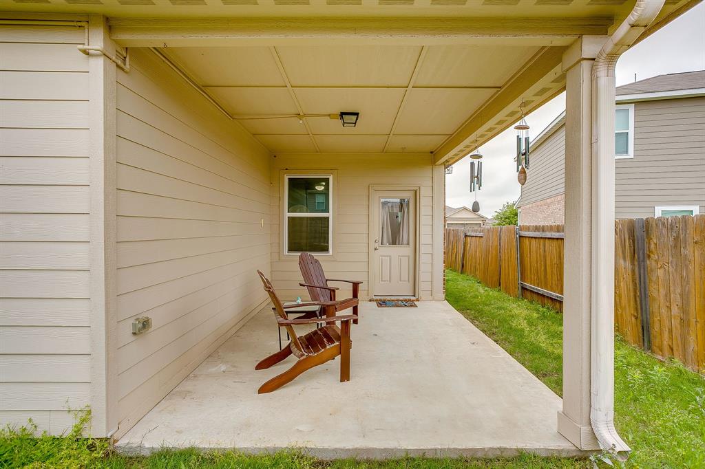 136 Kennedy Drive Venus, TX 76084 - Photo 21 of 27 a view of a porch with furniture and floor to ceiling window