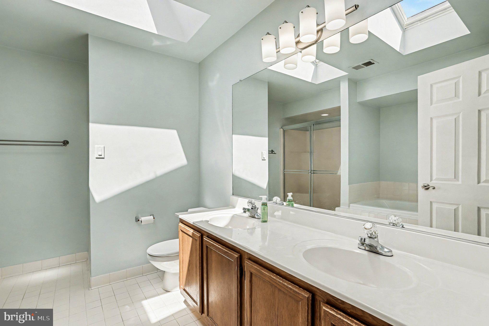 3 Perry Ridge Court Baltimore, MD 21237 - Photo 21 of 31 Bright and airy bathroom oasis.