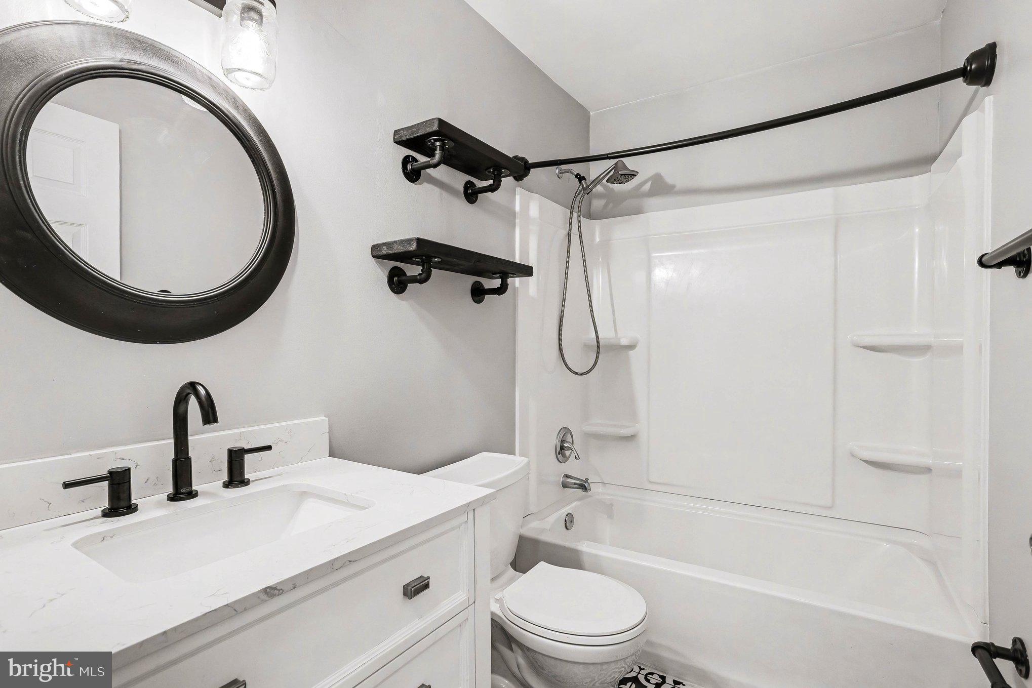 3 Perry Ridge Court Baltimore, MD 21237 - Photo 24 of 31 Sleek modern bathroom with stylish accents.
