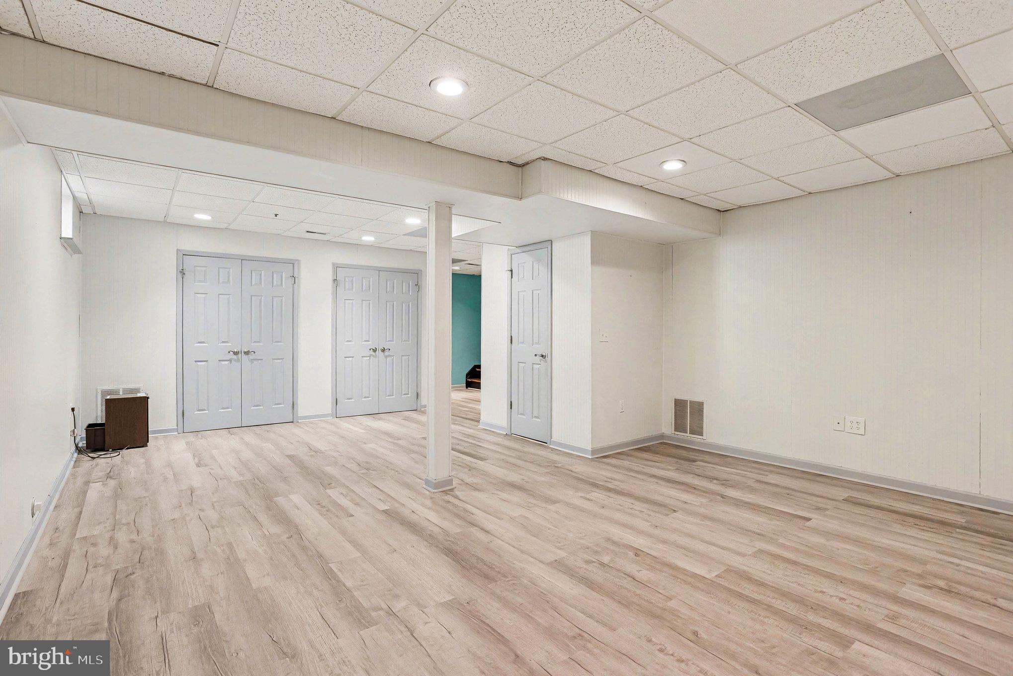 3 Perry Ridge Court Baltimore, MD 21237 - Photo 26 of 31 Spacious, versatile basement retreat.