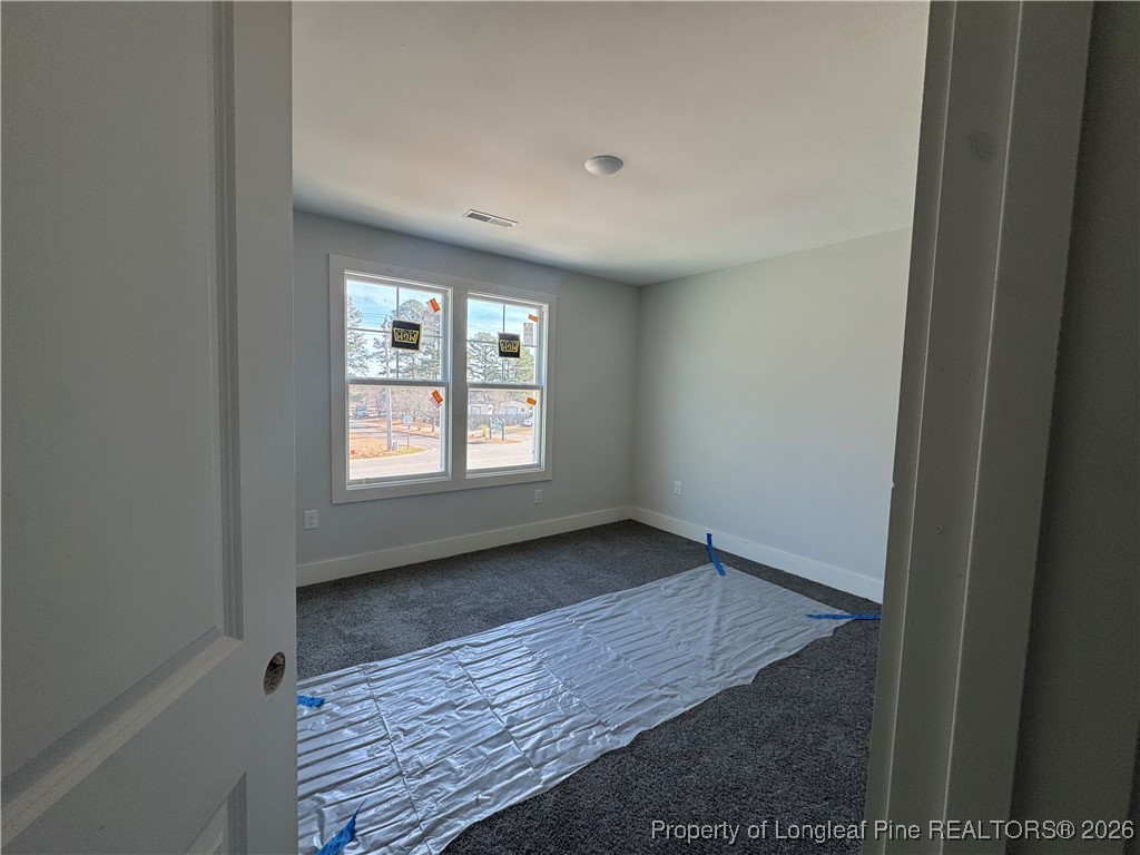 9806 Rockfish Road Raeford, NC 28376 - Photo 28 of 33 a view of an empty room with a window