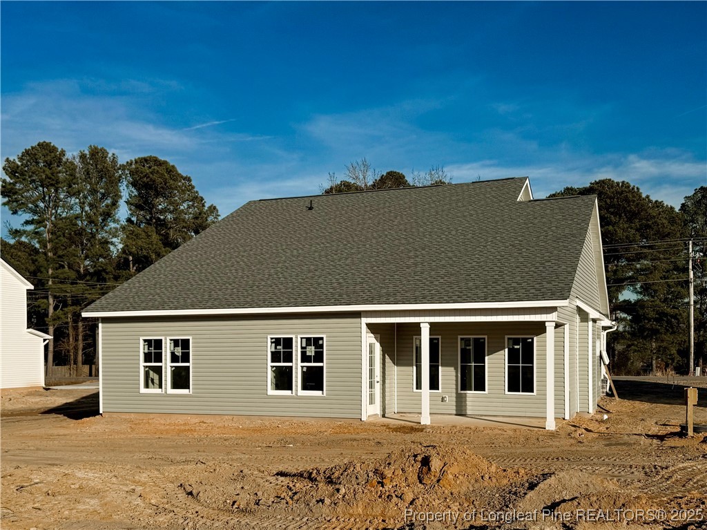 9806 Rockfish Road Raeford, NC 28376 - Photo 33 of 33 a front view of a house with a yard