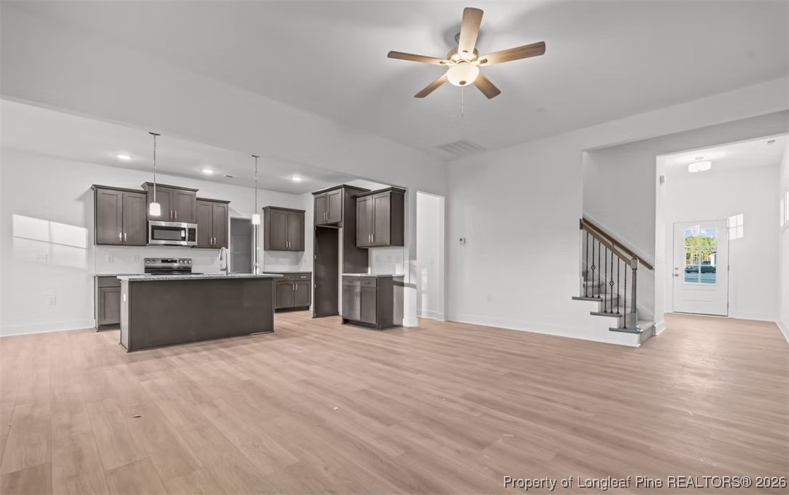 9806 Rockfish Road Raeford, NC 28376 - Photo 5 of 33 a view of kitchen with wooden floor