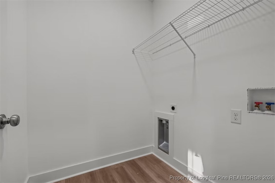 9806 Rockfish Road Raeford, NC 28376 - Photo 8 of 33 a view of small space with racks on the wall