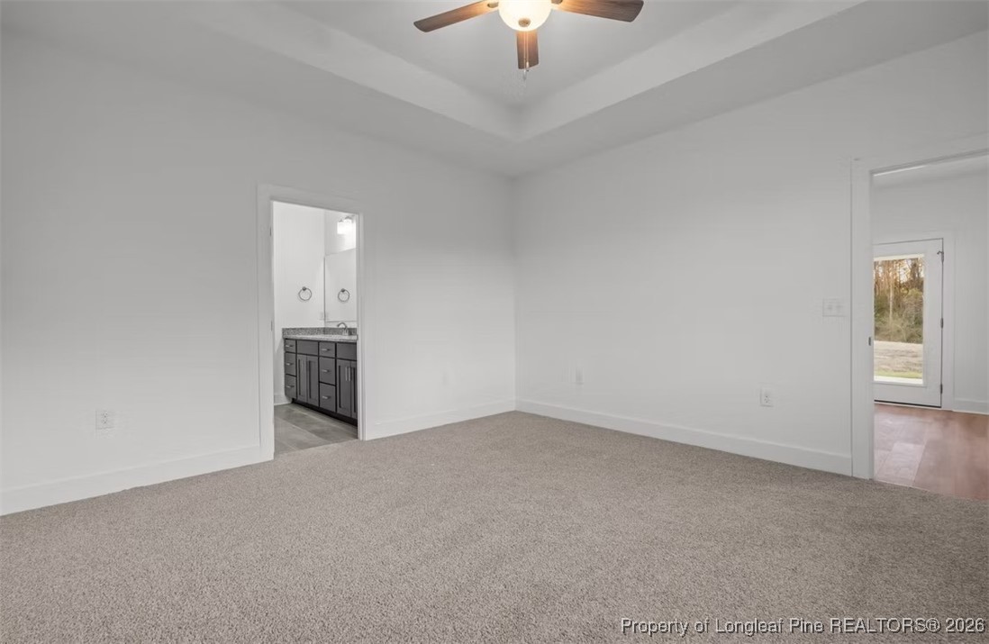 9806 Rockfish Road Raeford, NC 28376 - Photo 9 of 33 a view of a room with a ceiling fan and window