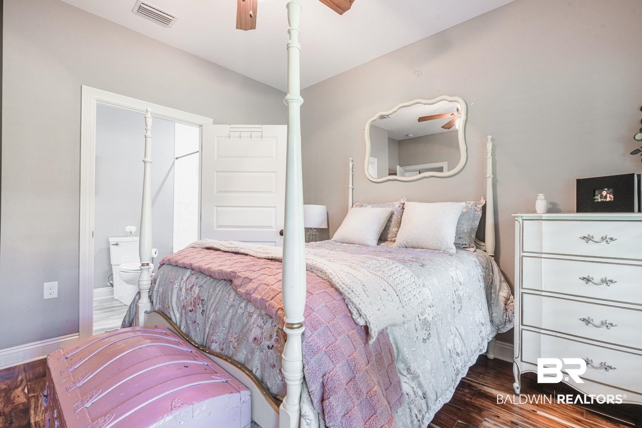 52579 Stockton Cemetery Road Stockton, AL 36507 - Photo 28 of 66 Bedroom with wood finished floors, ensuite bath, and a ceiling fan
