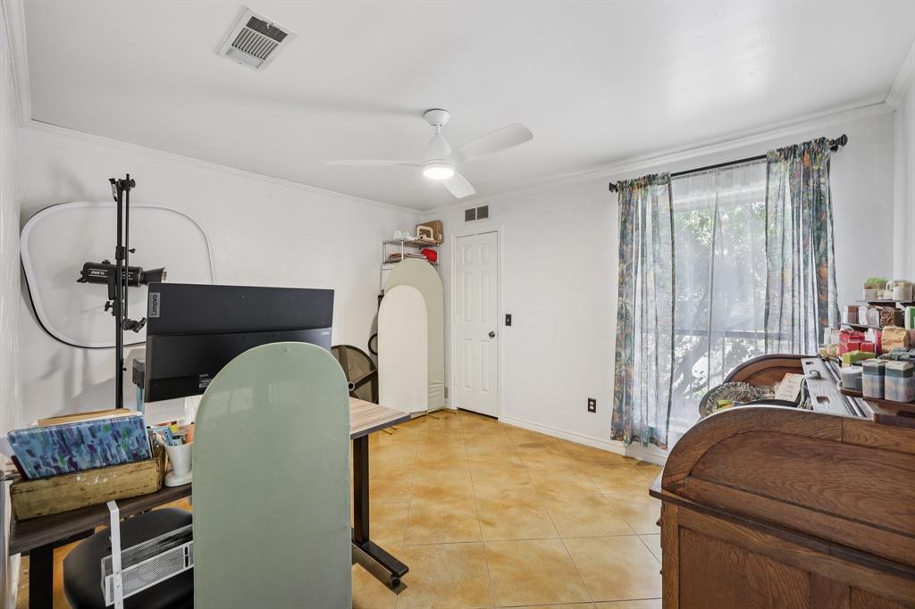 10202 Chisholm Trail Dallas, TX 75243 - Photo 18 of 40 Located off the kitchen and garage - currently used as an office.