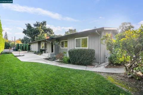 an aerial view of a house with a garden