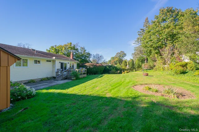 a view of a house with a big yard