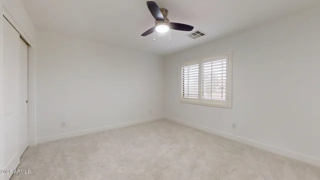 a bathroom with 2 sink and a mirror