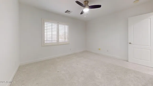 a bathroom with a a sink and a mirror