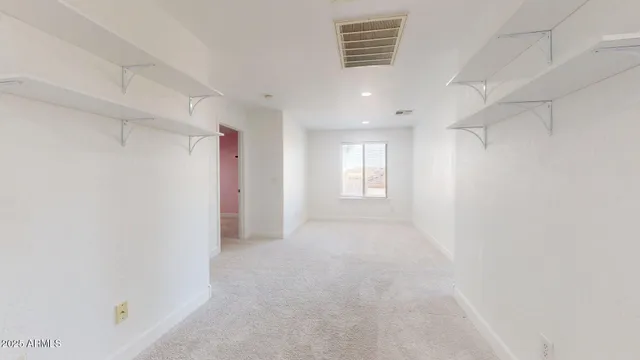 a view of a patio with couches chairs and a big yard