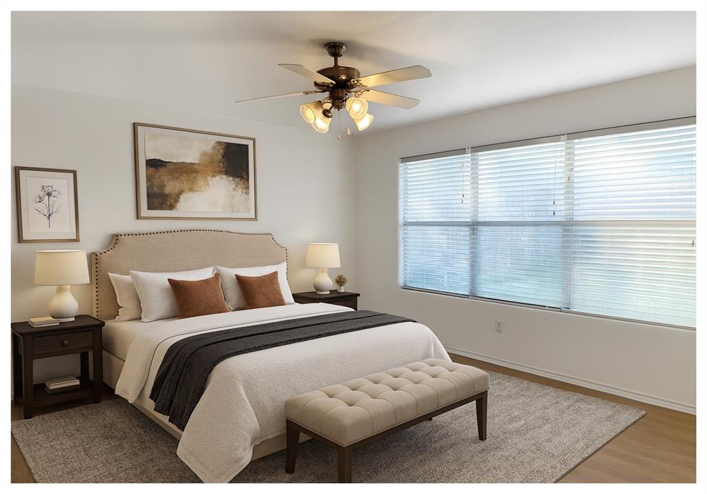7537 Lazy Spur Boulevard Fort Worth, TX 76131 - Photo 4 of 24 a bedroom with a bed and a window with a potted plant on a table