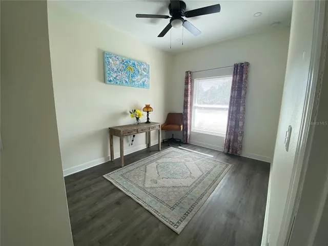 a view of a hallway with workspace