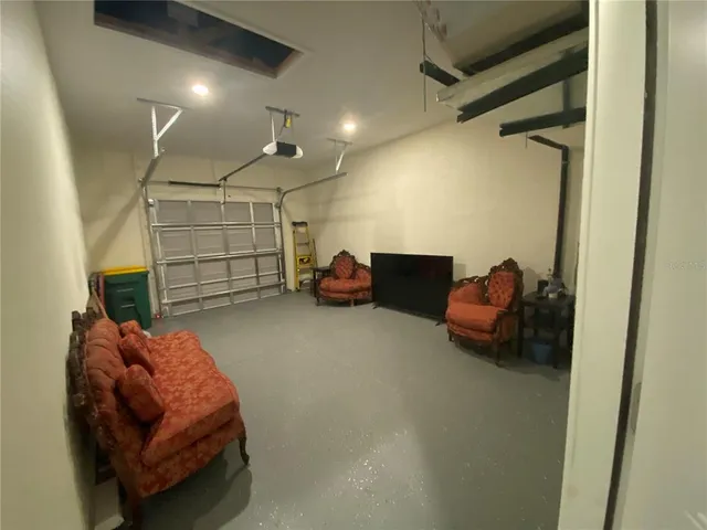 a livingroom with furniture and a couch