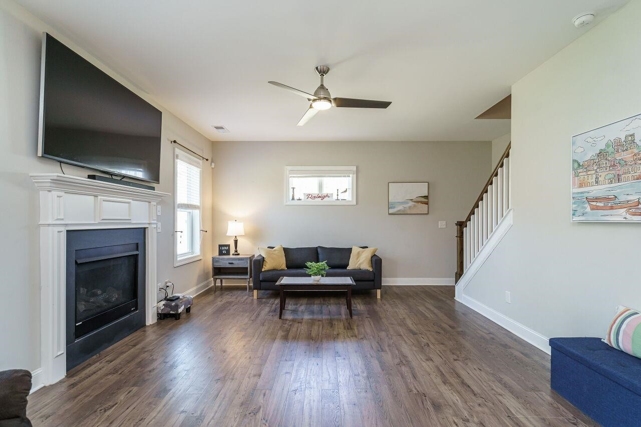 1509 Yakimas Road Raleigh, NC 27603 - Photo 7 of 38 Friends and family will enjoy spending time by the gas logs on cool North Carolina days. Family Room