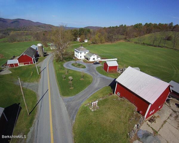 2437 North Pownal Road Pownal, VT 05261 - Photo 1 of 19 a view of a chairs and table in the terrace