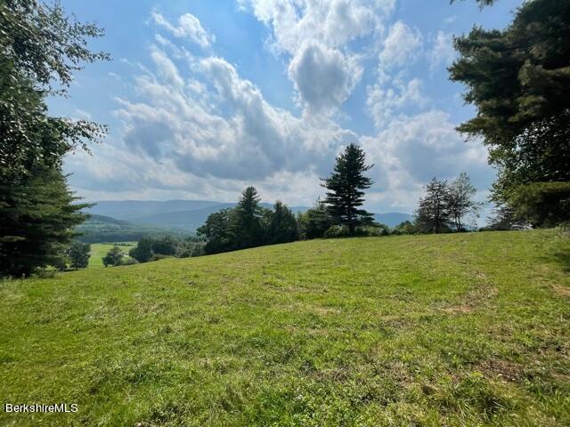 2437 North Pownal Road Pownal, VT 05261 - Photo 5 of 19 a view of a field with an trees