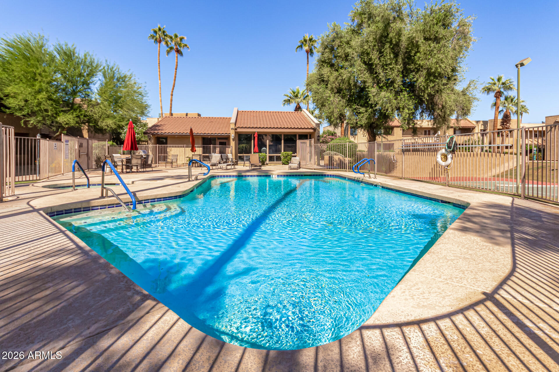 5877 North Granite Reef Road, Unit 1133 Scottsdale, AZ 85250 - Photo 30 of 33 a view of a swimming pool with a patio