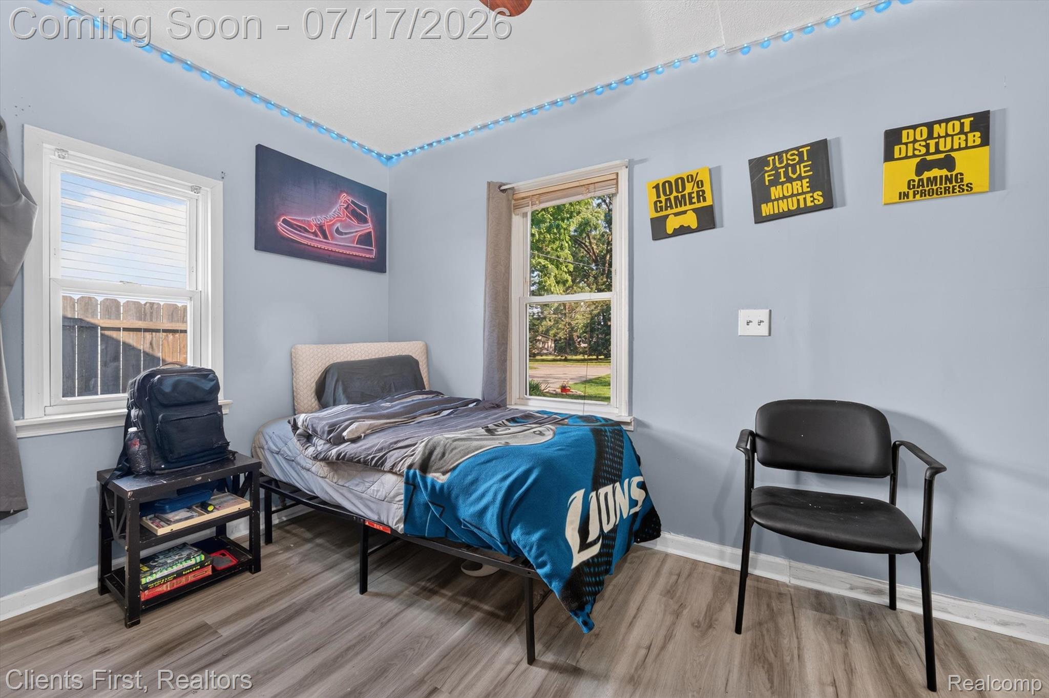 36852 Chase Street Romulus, MI 48174 - Photo 20 of 40 Room featuring light blue walls and wood-finish flooring