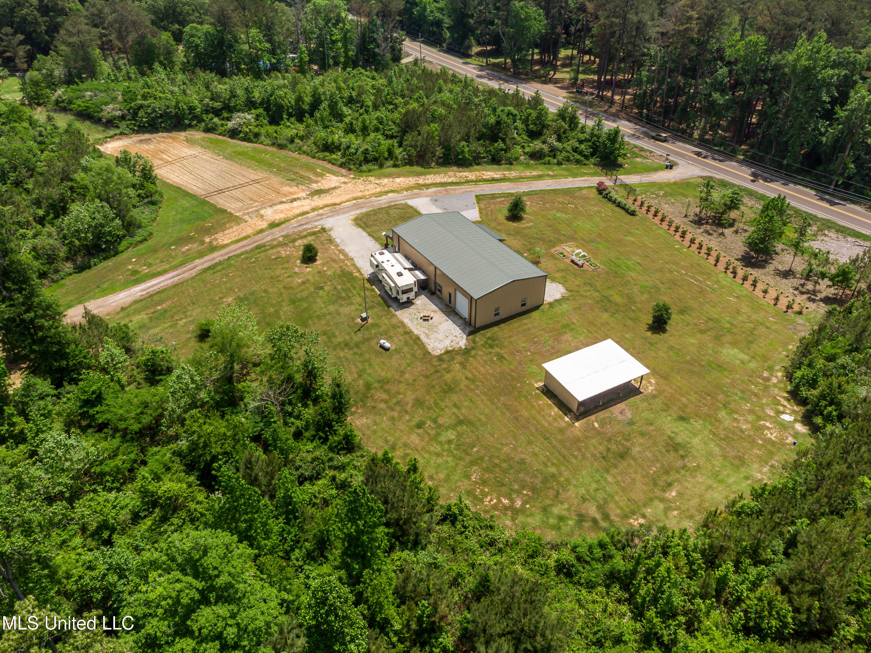1998 Highway 16 Carthage, MS 39051 - Photo 11 of 40 1998 Ms Hy 16 W drone-6