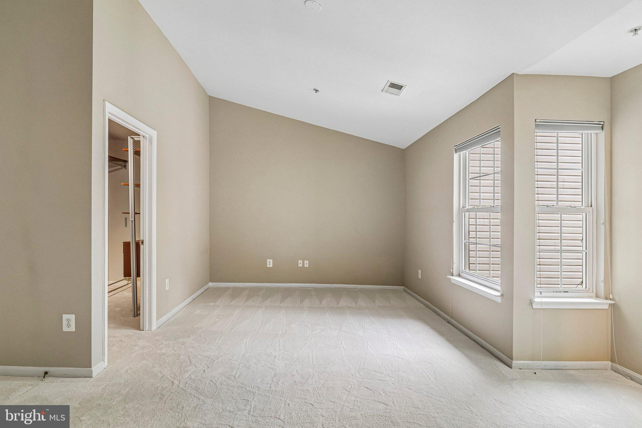 217 Braxton Way, Unit 217 Edgewater, MD 21037 - Photo 12 of 27 a view of an empty room with a window