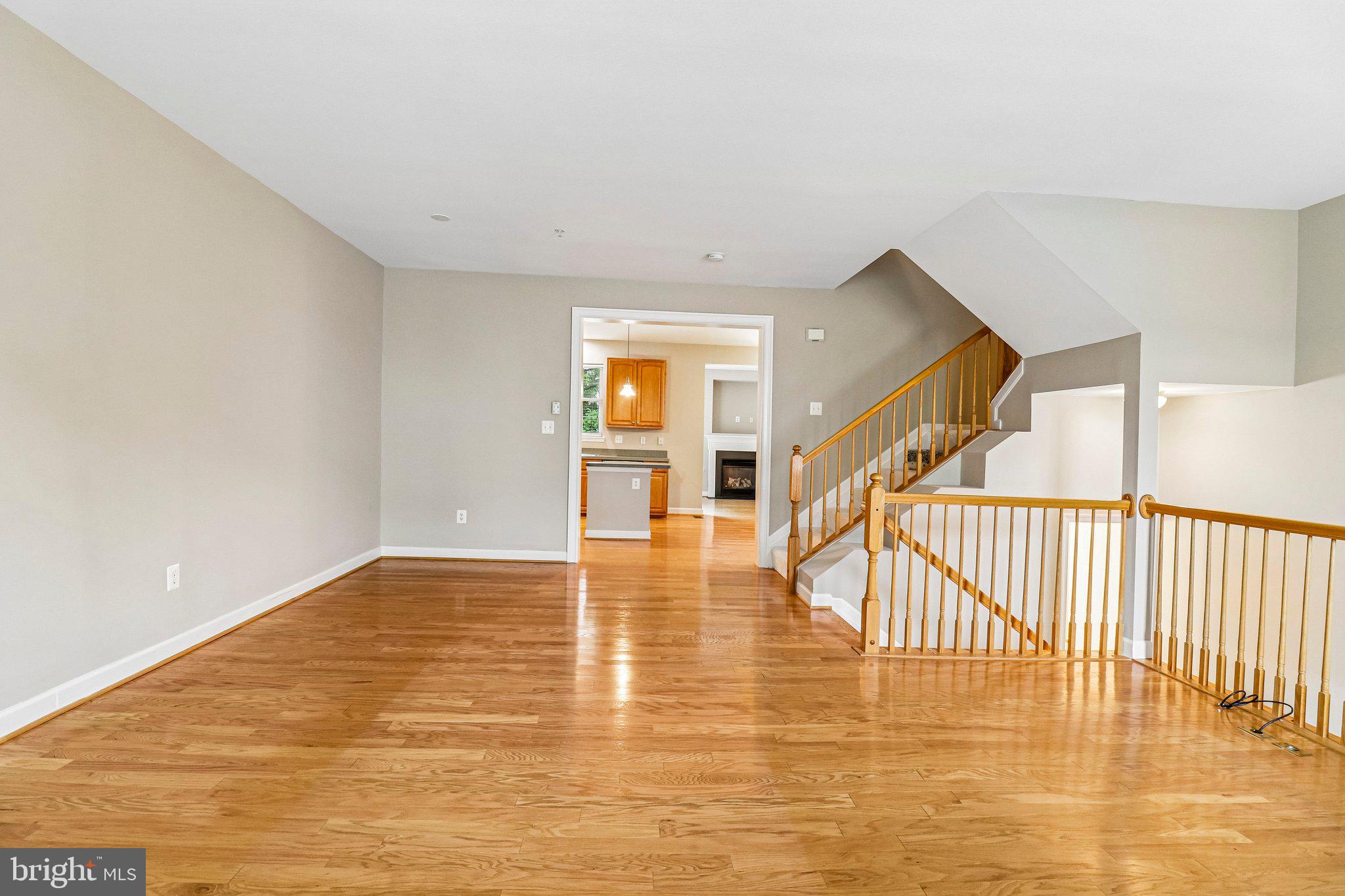 217 Braxton Way, Unit 217 Edgewater, MD 21037 - Photo 4 of 27 a view of an empty room with glass door