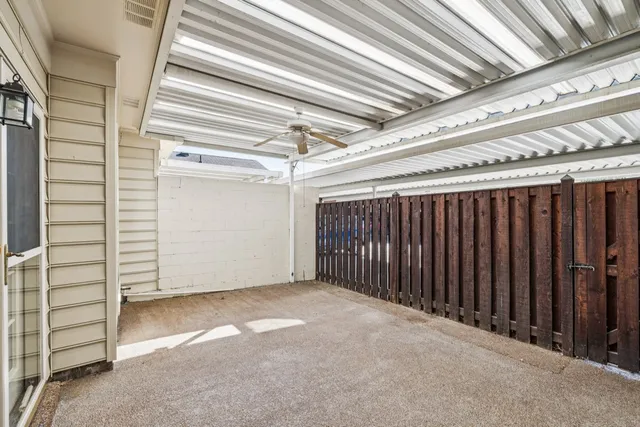 a view of a room with an empty space