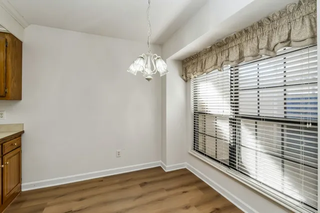 a view of a room with windows