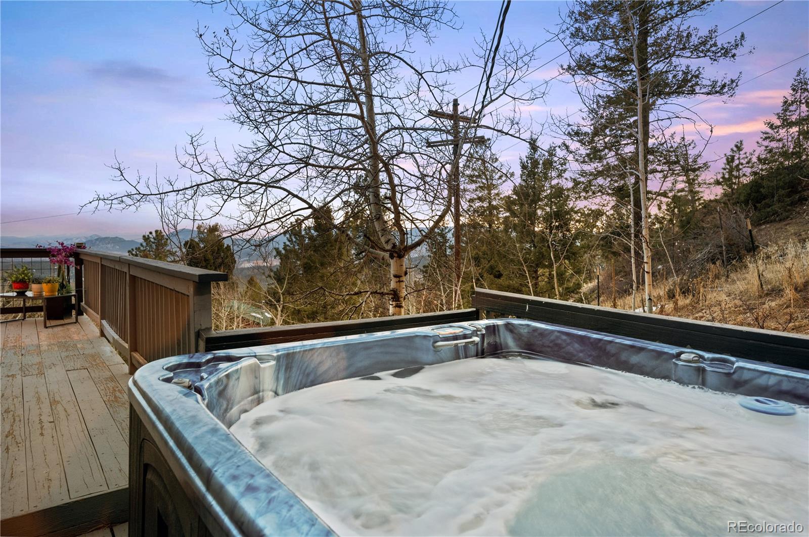 11740 Baca Road Conifer, CO 80433 - Photo 27 of 49 a view of outdoor space with seating area