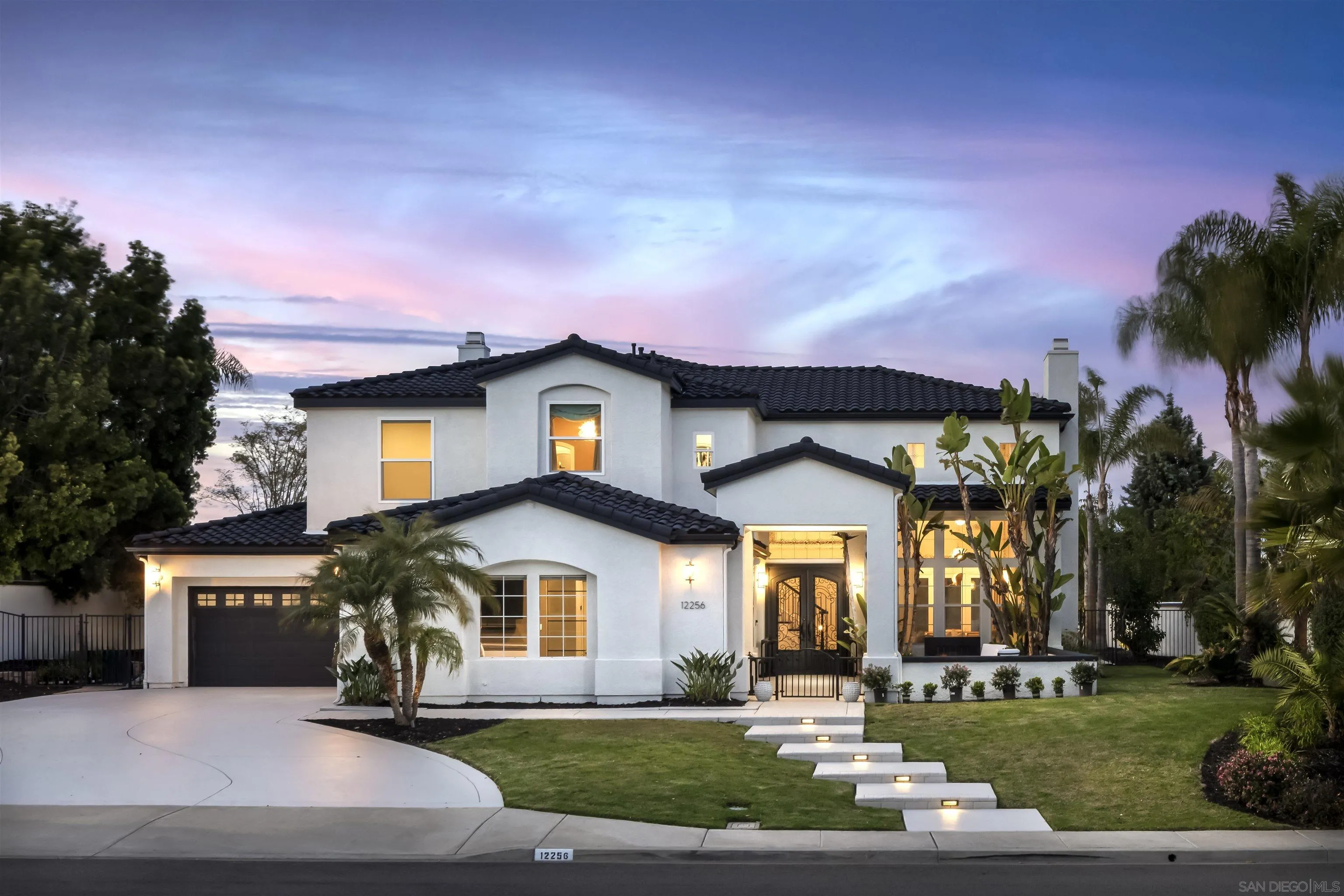 12256 Berea Court Poway, CA 92064 - Photo 1 of 23 a front view of a house with a yard