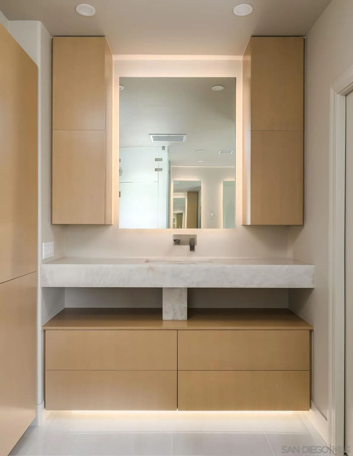 12256 Berea Court Poway, CA 92064 - Photo 15 of 23 a bathroom with a sink and a mirror