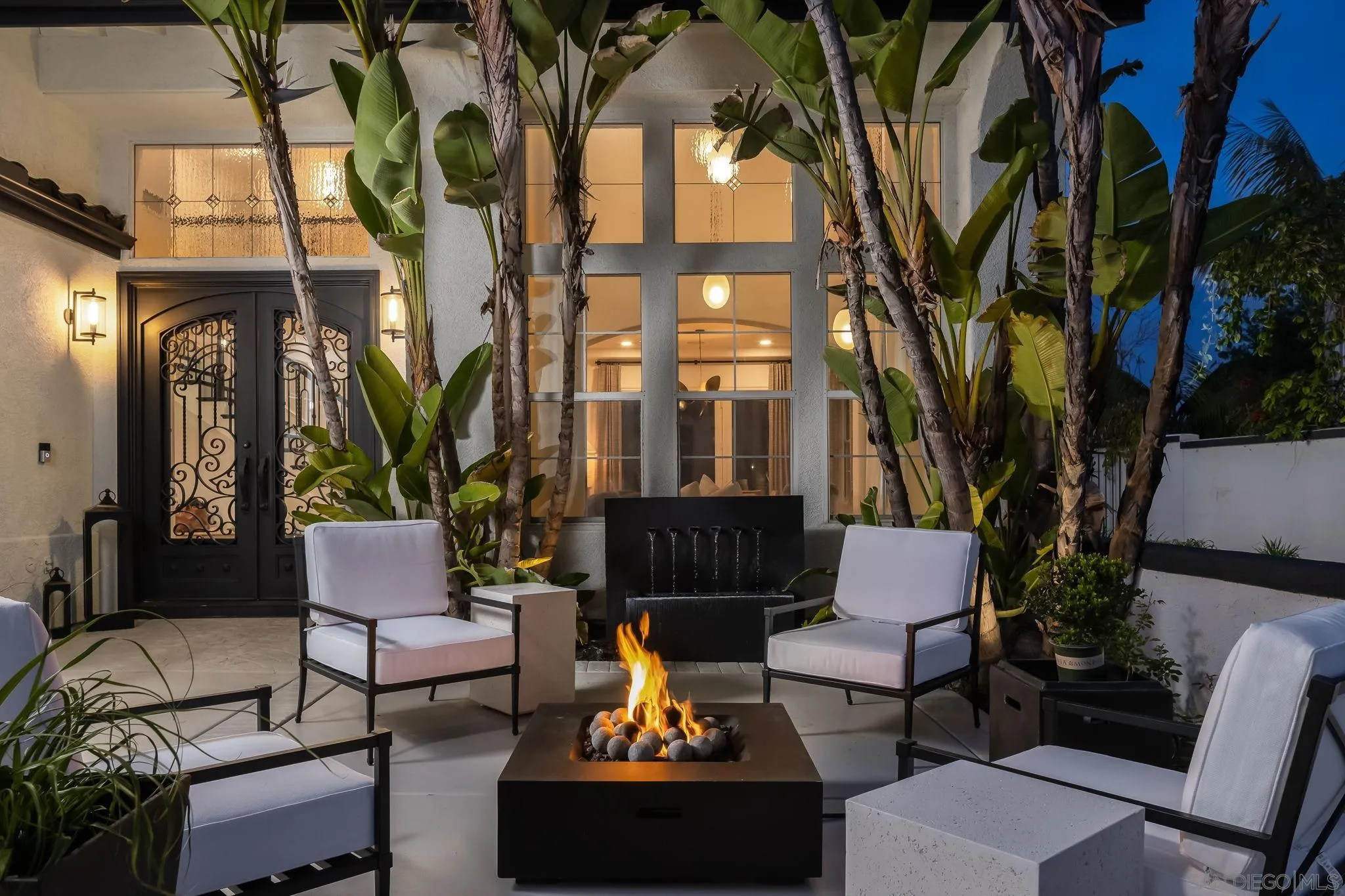 12256 Berea Court Poway, CA 92064 - Photo 2 of 23 a building outdoor space with patio couches and potted plants