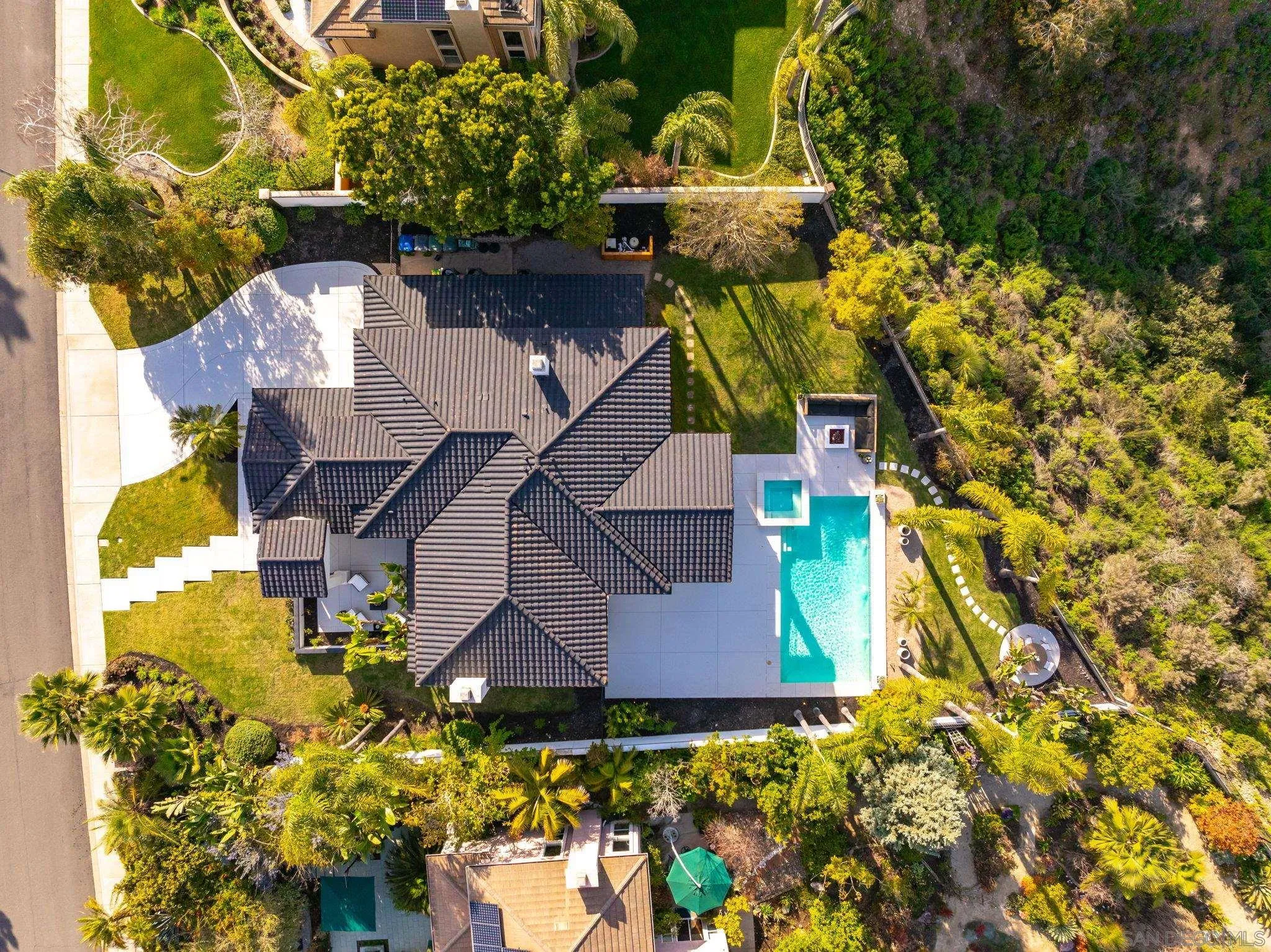 12256 Berea Court Poway, CA 92064 - Photo 22 of 23 a aerial view of a house with swimming pool and large trees