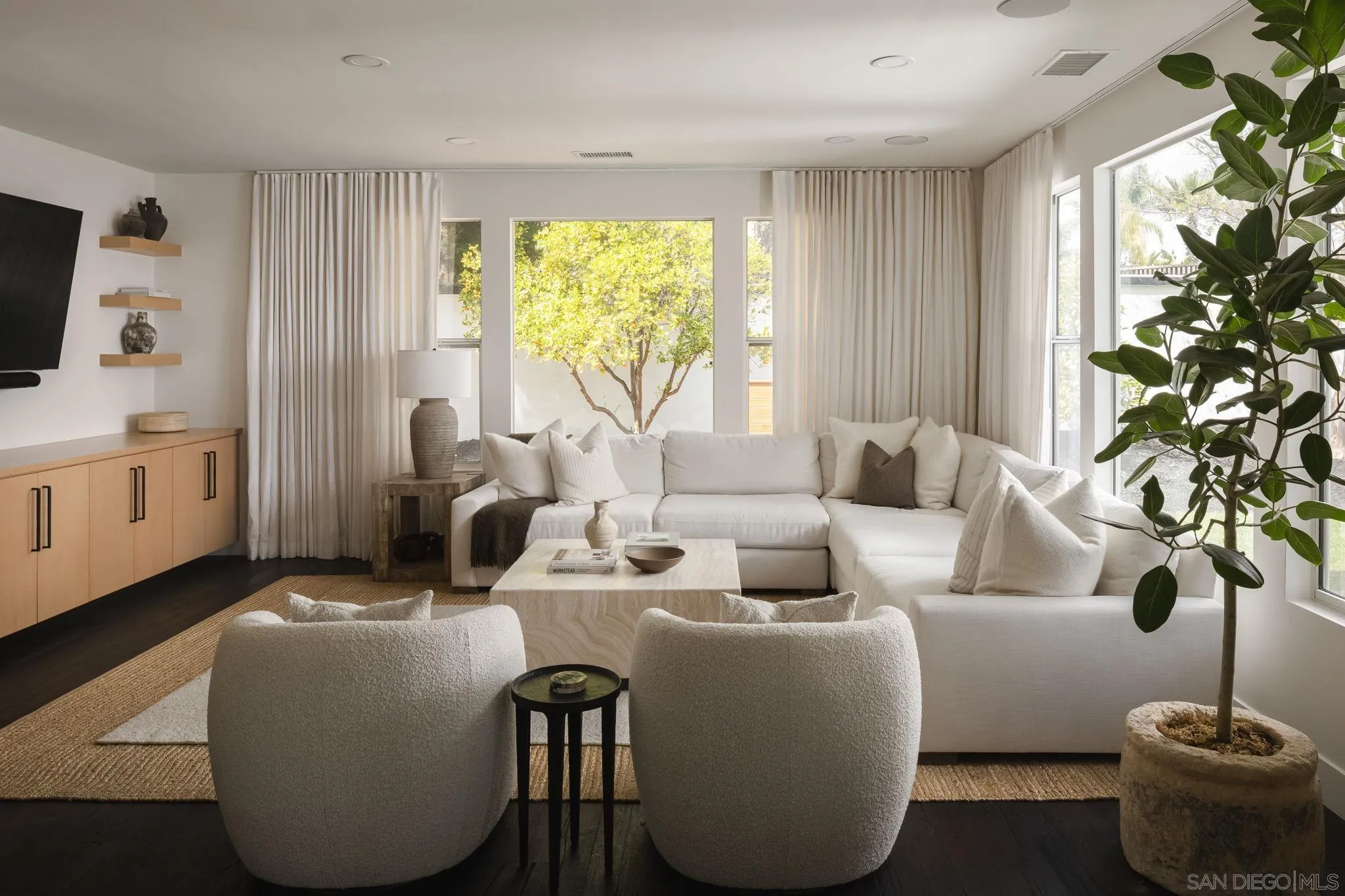 12256 Berea Court Poway, CA 92064 - Photo 8 of 23 a living room with furniture and a potted plant