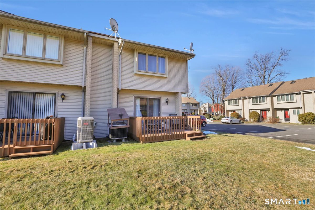 827 Oronoke Road, Unit 51 Waterbury, CT 06708 - Photo 21 of 24 Note the thoughtfully designed AC compressor.