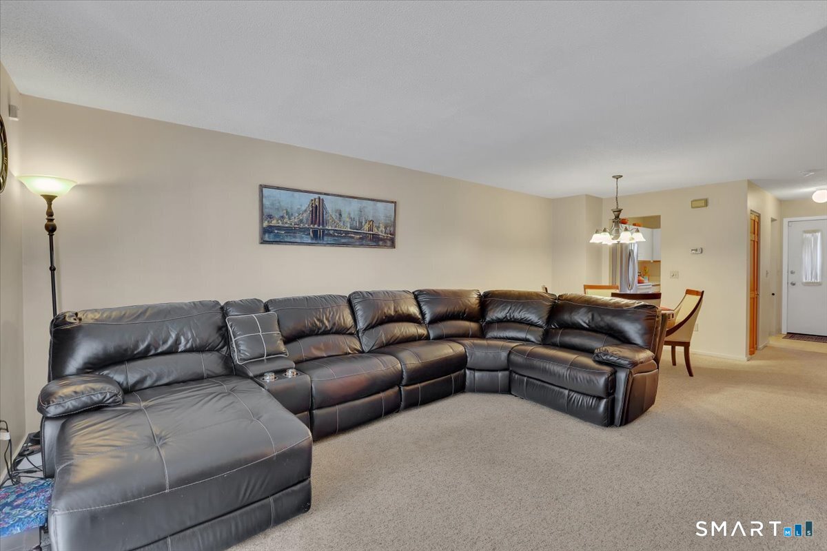 827 Oronoke Road, Unit 51 Waterbury, CT 06708 - Photo 22 of 24 Spacious Living area.