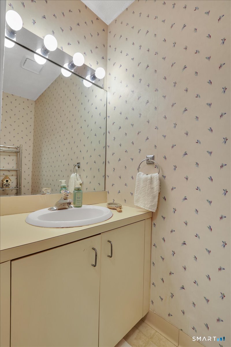 827 Oronoke Road, Unit 51 Waterbury, CT 06708 - Photo 6 of 24 First Floor Half bath