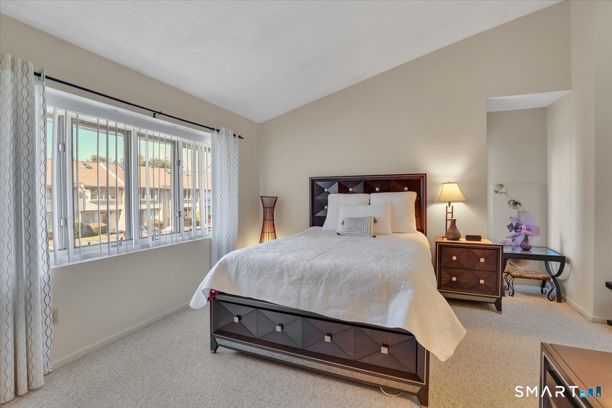 827 Oronoke Road, Unit 51 Waterbury, CT 06708 - Photo 9 of 24 Primary bedroom. Skylight and Walk-in closet are not shown.