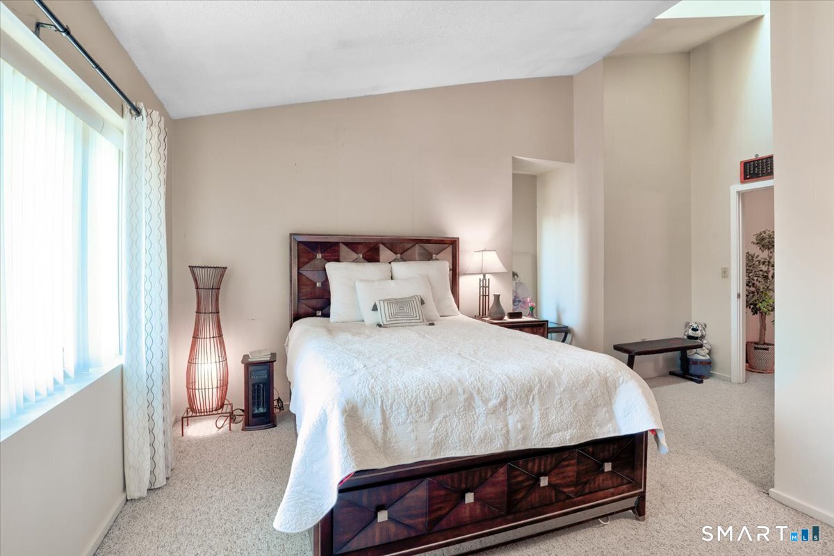 827 Oronoke Road, Unit 51 Waterbury, CT 06708 - Photo 10 of 24 Primary room with skylight