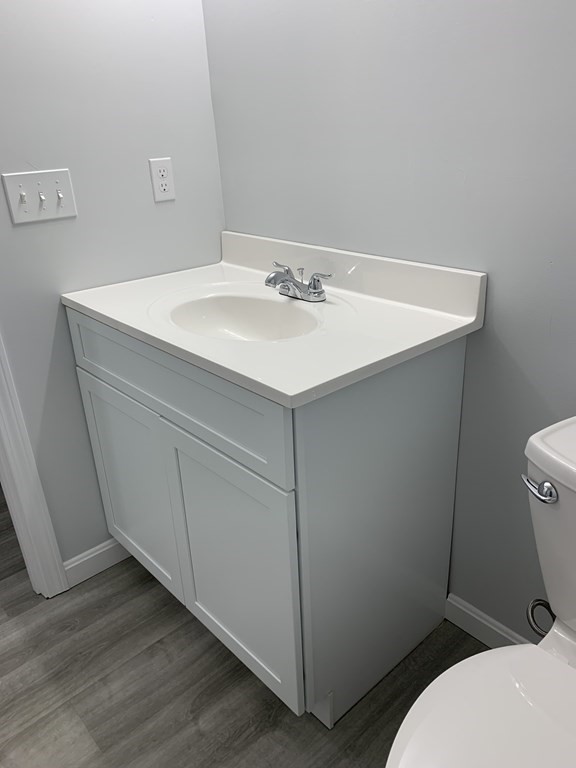 445 West Royalston Road Athol, MA 01331 - Photo 6 of 12 a bathroom with a sink mirror vanity and toilet