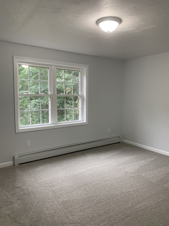 445 West Royalston Road Athol, MA 01331 - Photo 8 of 12 an empty room with a window