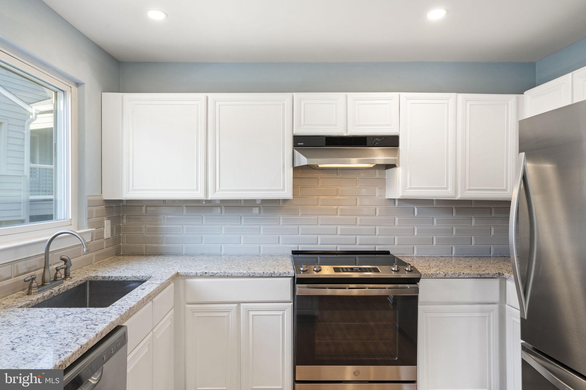 1512 Summerchase Court, Unit B Reston, VA 20194 - Photo 12 of 29 Stove replaced in 2022*Cabinets painted in 2021