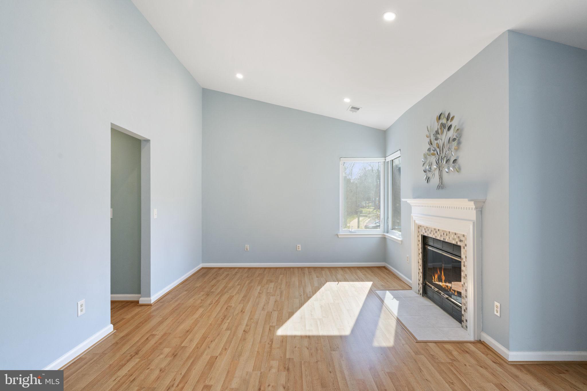 1512 Summerchase Court, Unit B Reston, VA 20194 - Photo 9 of 29 Tile floor in front of fireplace replaced in 2019