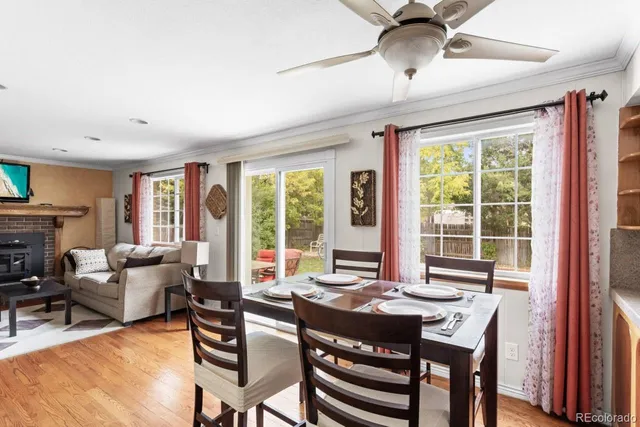 a view of a livingroom with furniture and a window