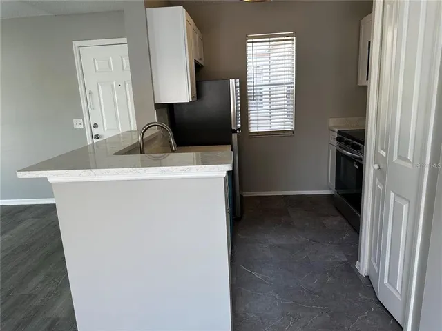 a view of a sink and a mirror