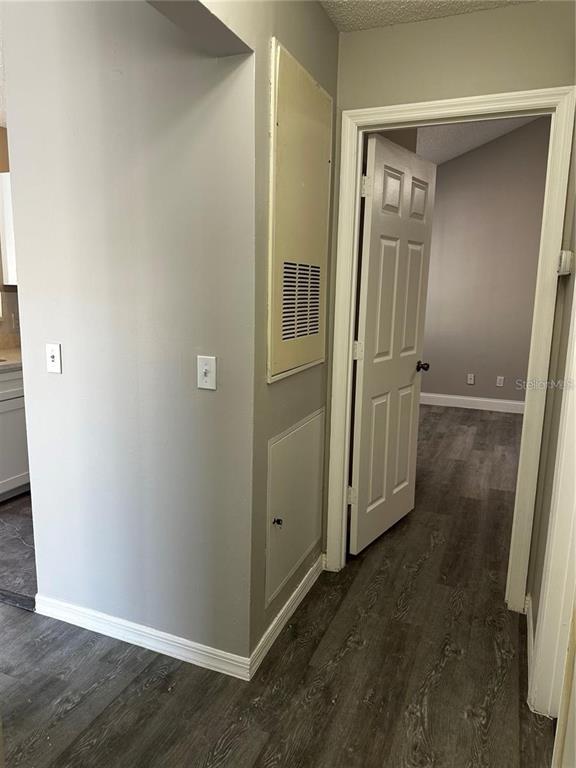 652 Roaring Drive, Unit 234 Altamonte Springs, FL 32714 - Photo 27 of 39 an empty room with wooden floor