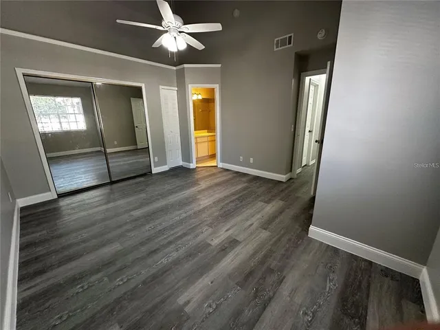 a bathroom with a double vanity sink toilet and shower